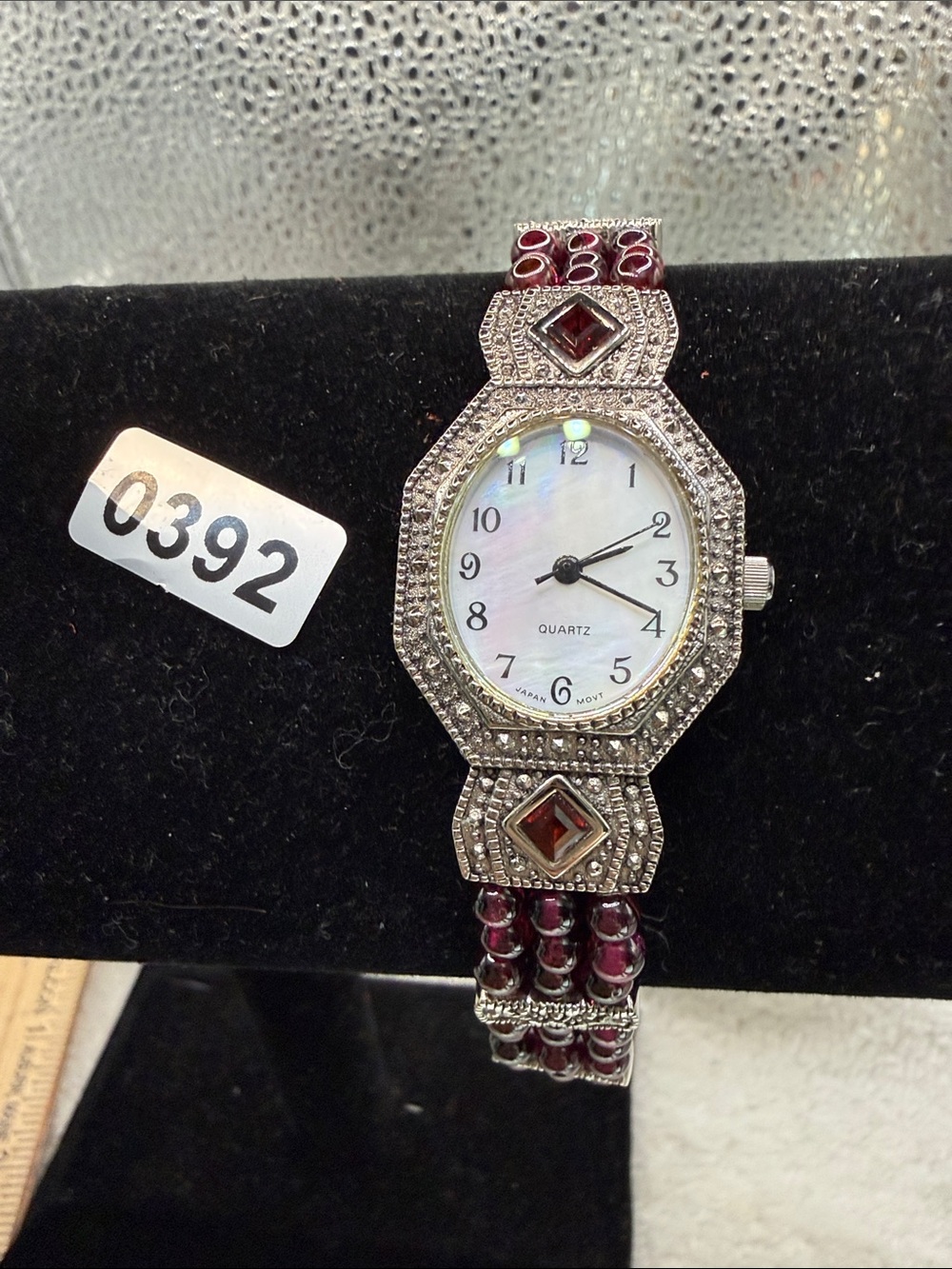 Avon Silver-Tone Watch with Red Amethyst Accents